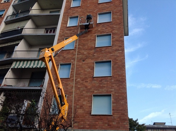 Isolamento condominio. Insufflaggio muri perimetrali. Novi Ligure, Alessandria (AL).